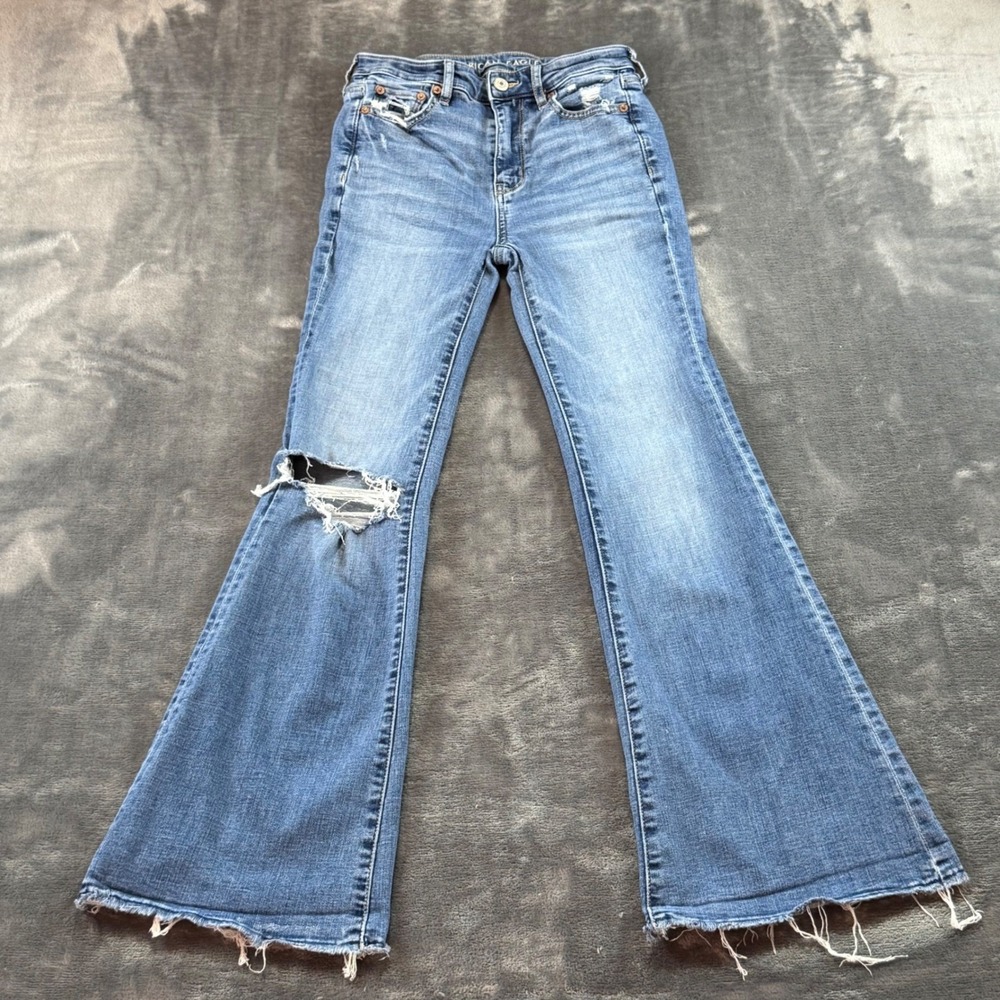 American Eagle Super Hi-Rise Flare Jeans Distressed Raw Hem Womens 0 Regular